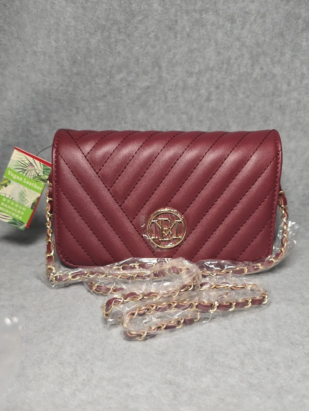 Quilted Wine Red Crossbody Bag with Gold Chain Detail